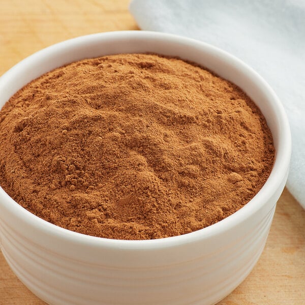 A bowl of brown Regal Apple Pie spice powder.