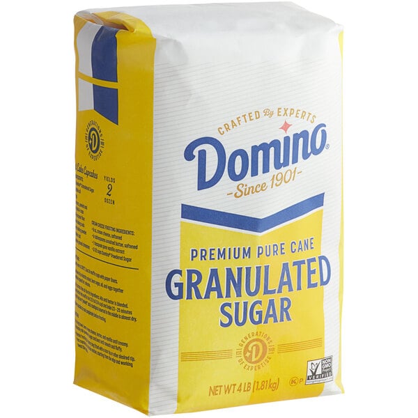 A case of 10 Domino Granulated Sugar bags on a white surface.
