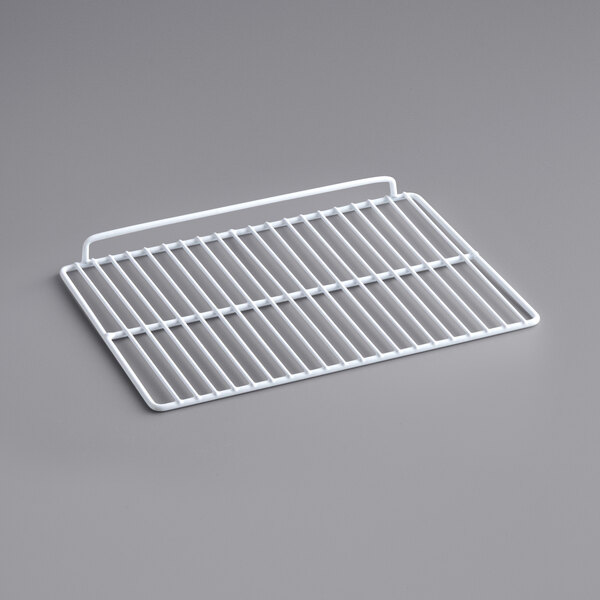 A white coated wire shelf for an Avantco countertop display refrigerator.