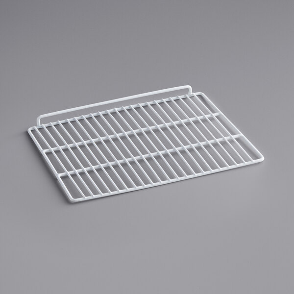 An Avantco white coated wire shelf on a gray surface.