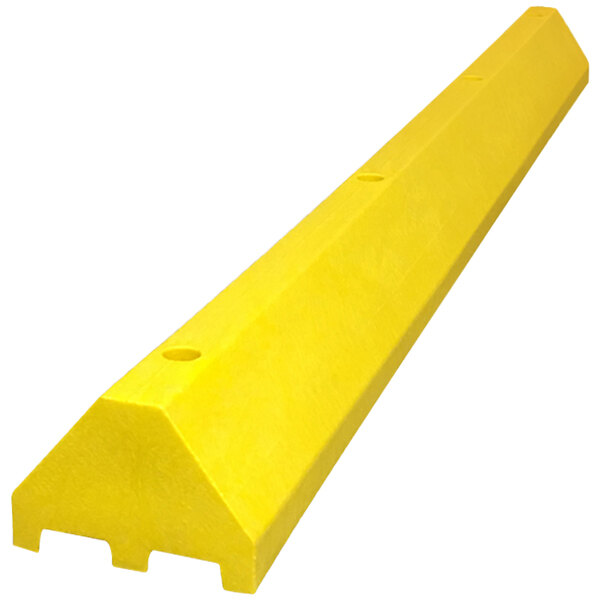 A yellow plastic truck parking block with channels.