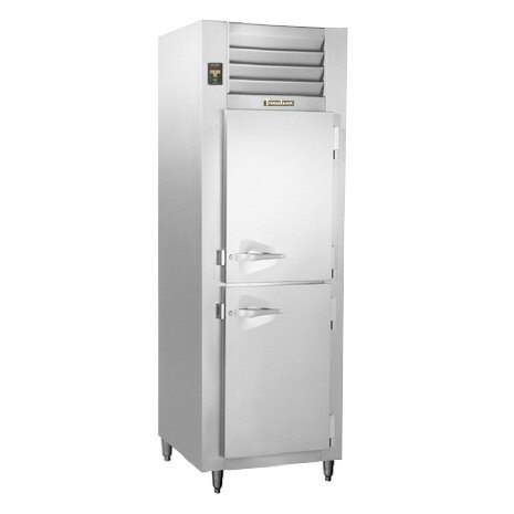 A Traulsen stainless steel reach-in freezer with half doors.