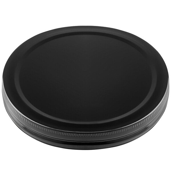 A black plastic lid for a Tablecraft beverage dispenser on a white background.
