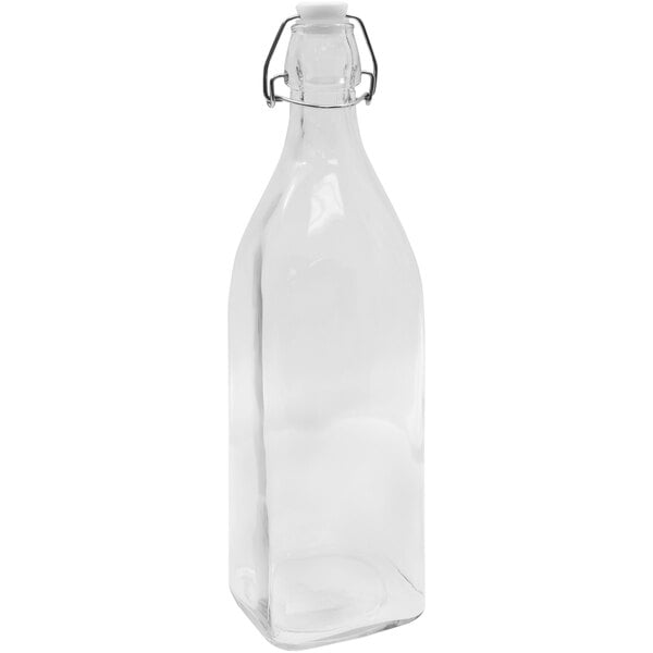 A clear glass Tablecraft bottle with a wire bail swing top lid.