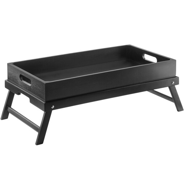 A black rubberwood folding tray riser with metal legs.