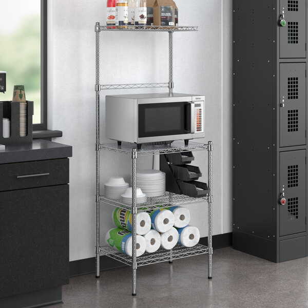 A Regency chrome wire shelving kit with a microwave on a shelf.