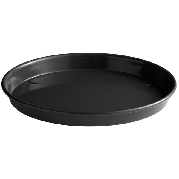 A black round Chicago Metallic deep dish pizza pan.
