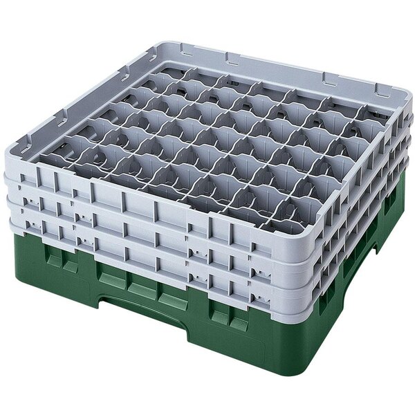 A white and green plastic Cambro glass rack with six compartments.