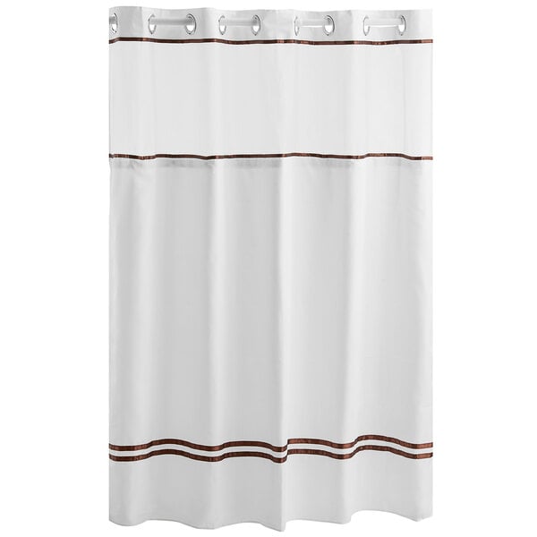 A white shower curtain with brown trim.