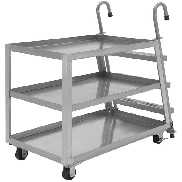 A Vestil aluminum metal cart with three shelves and a steel ladder.