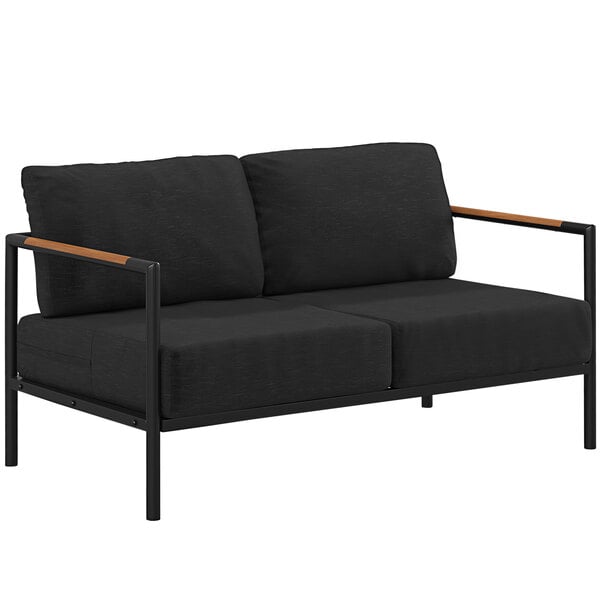 A black loveseat with wooden armrests and teak accents.