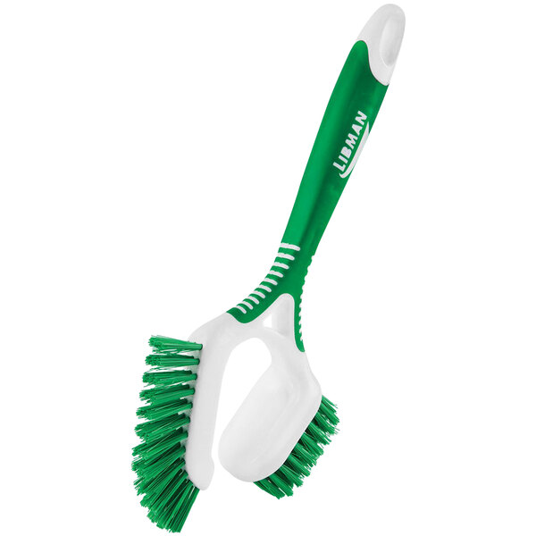 A green and white Libman Dual-Sided Tile and Grout Brush with a handle.