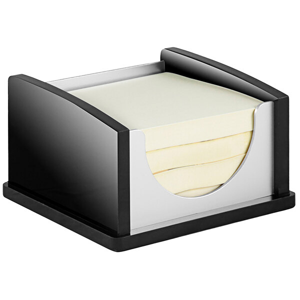 A black and aluminum Kantek memo pad holder with paper inside.