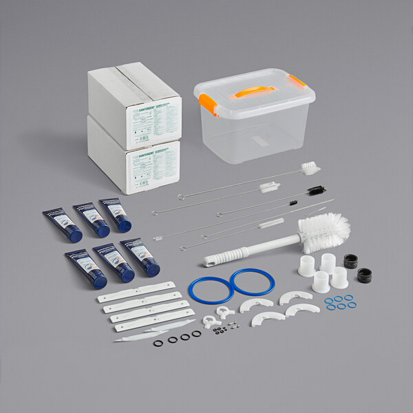 A Spaceman maintenance kit with various tools and supplies including blue and white tubes.