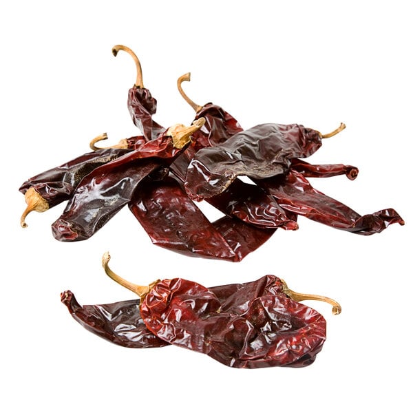 A pile of dried Guajillo chili peppers.