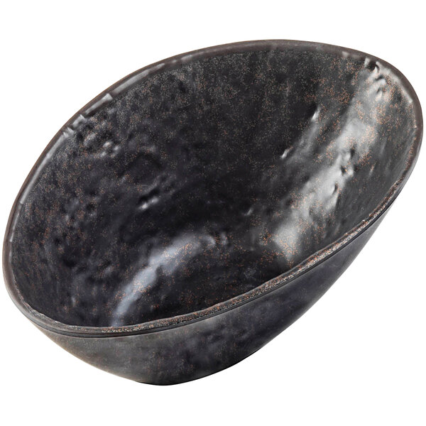 A brown melamine bowl with brown speckles.