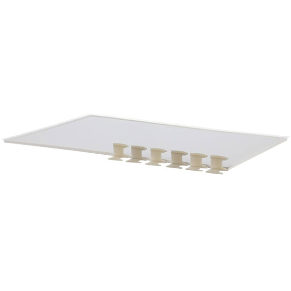 A white rectangular ceramic tray with four white plastic pegs.