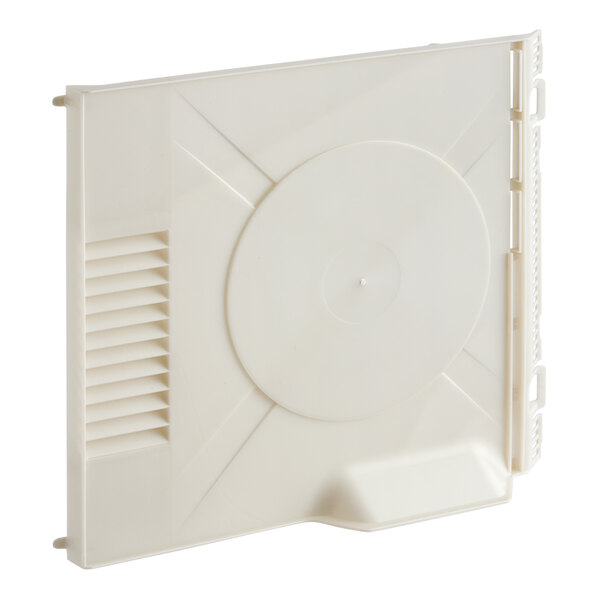 A white plastic cover with a vent over a white circle with a small dot in the center.