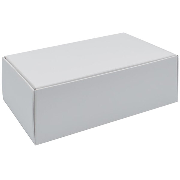A 6 1/2" x 3 1/4" x 2 5/8" white candy box with a lid.