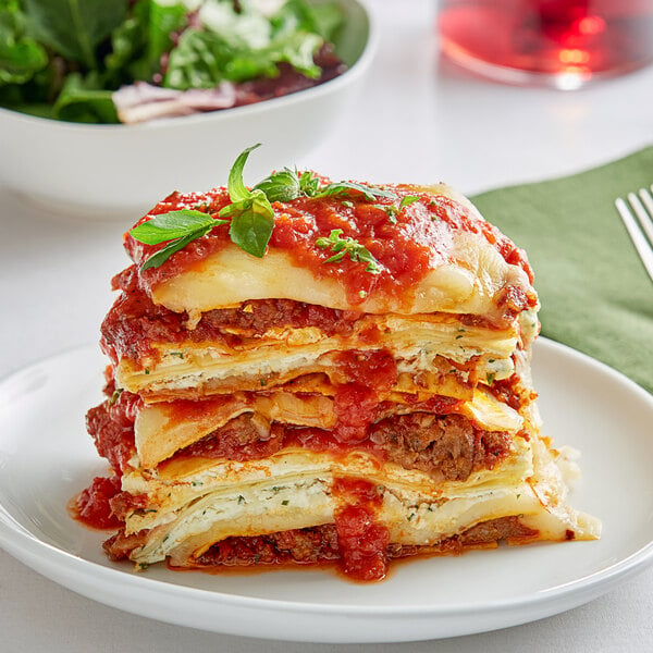 A stack of Barilla Oven Ready lasagna noodles on a plate.