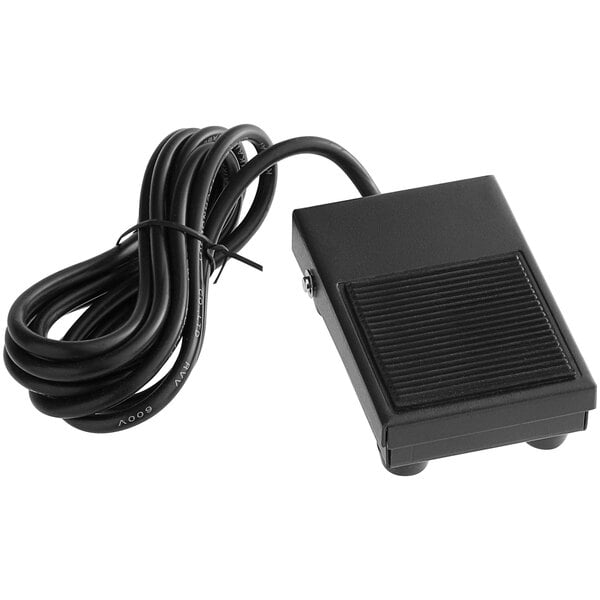 A black foot pedal with a black cord.