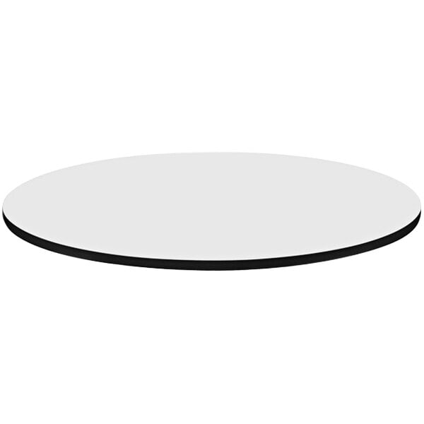 A white circular Correll table top with black edges.