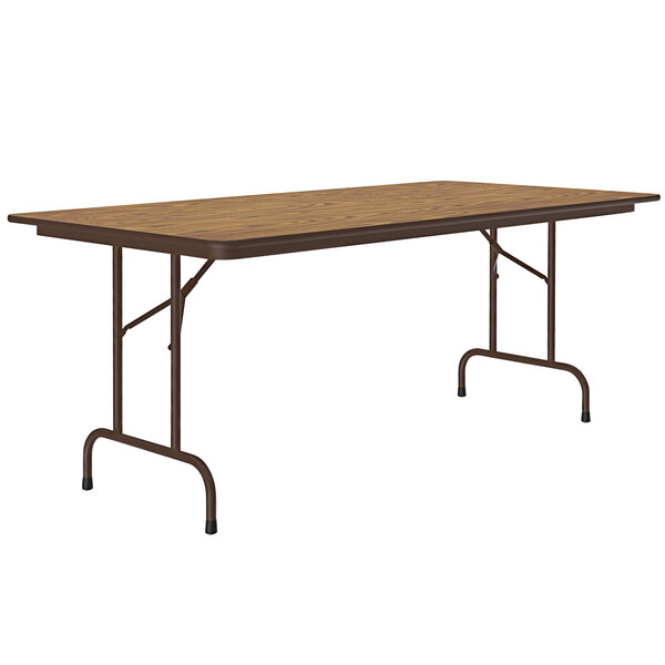 A brown rectangular Correll table with a metal frame and wood top.
