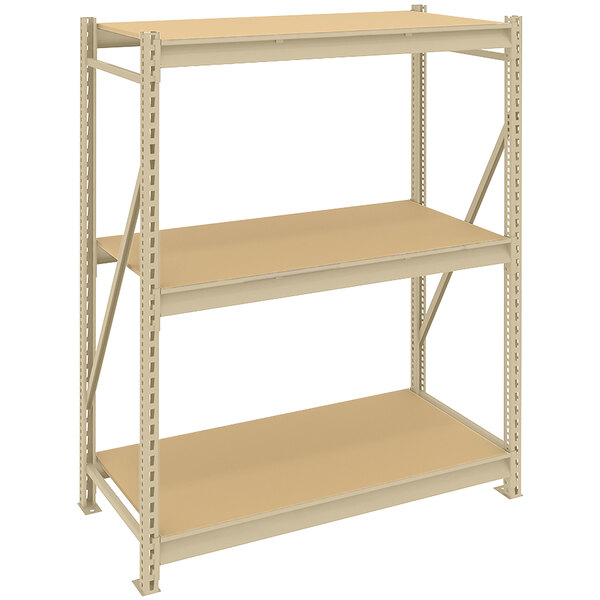 A Tennsco beige metal boltless shelving unit with particleboard decking.