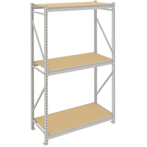 A light gray metal Tennsco boltless shelving unit with particleboard shelves.