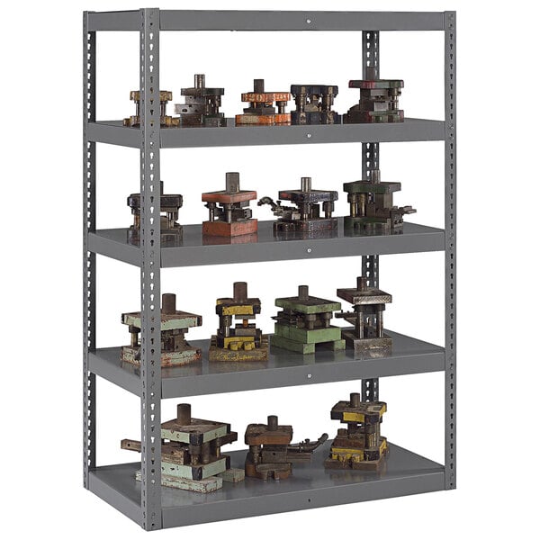 A Tennsco dark gray steel shelving unit with metal objects on the shelves.