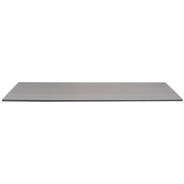A grey rectangular Front of the House bamboo buffet board on a white surface.