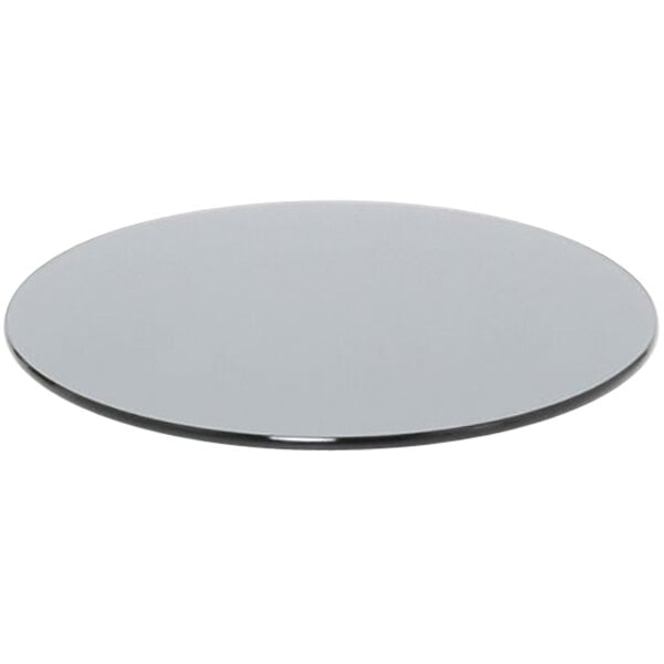 A round smoke tempered glass buffet board on a white background.