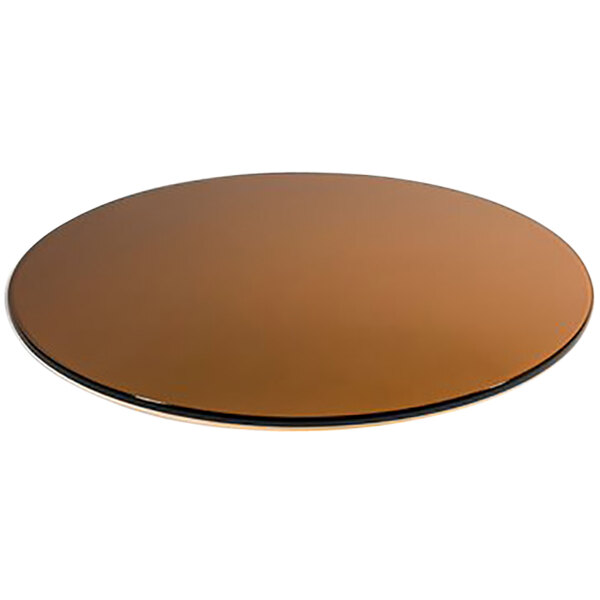 A round brown tempered glass buffet board with black edges.