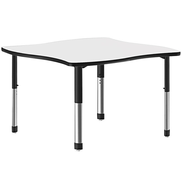 A white rectangular Correll collaborative desk with black legs.