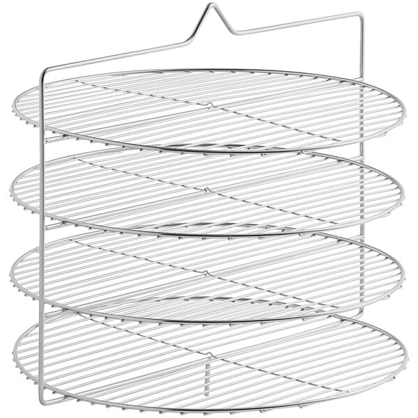 A metal rotary shelf rack with four round metal shelves on it.