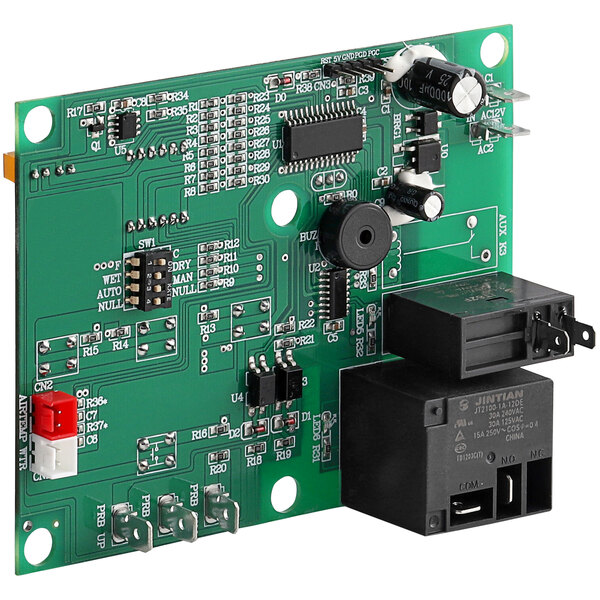 A green ServIt circuit board with black and white components.