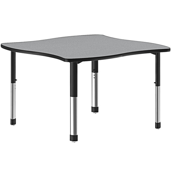 A grey rectangular Correll collaborative desk with black legs and a black band.