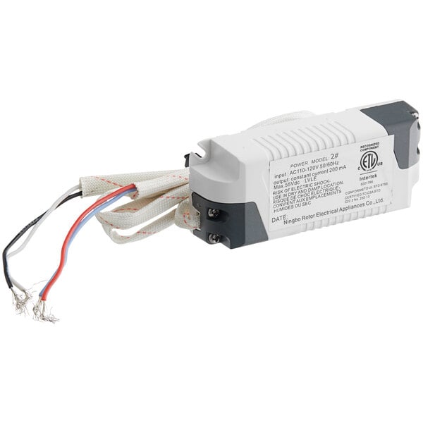 A white and black ServIt Power Drive electrical device with wires.