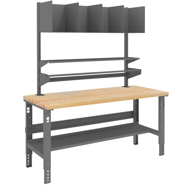 A wood and grey metal workbench with shelves and a cantilever system on top.