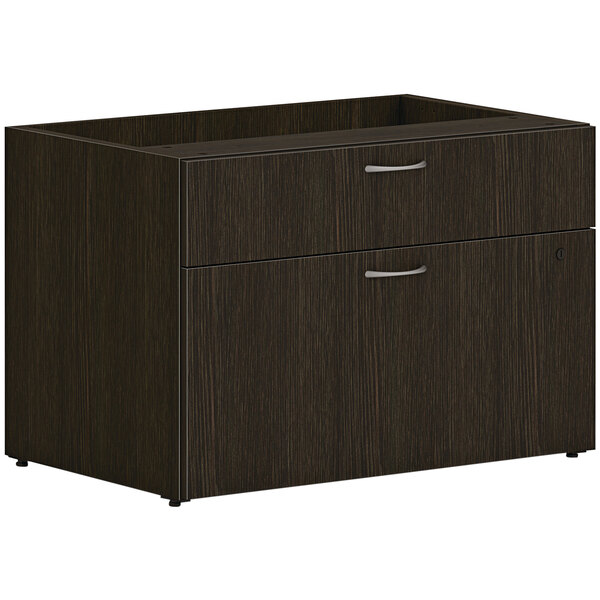 A Java oak low personal credenza with 2 drawers.