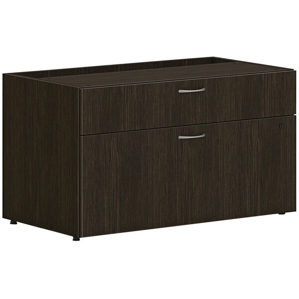 A brown wooden HON personal credenza cabinet with 2 drawers.
