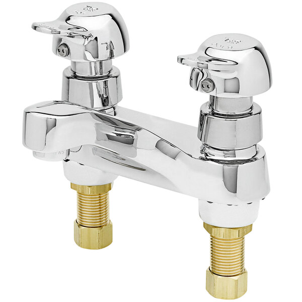 A T&S deck mounted pivot action metering faucet with brass handles.