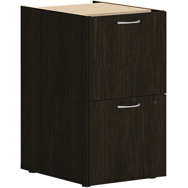 A Java oak HON file cabinet with 2 drawers and silver handles.