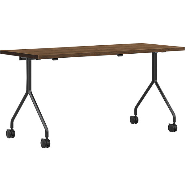 A HON rectangular laminate nesting table with wheels.