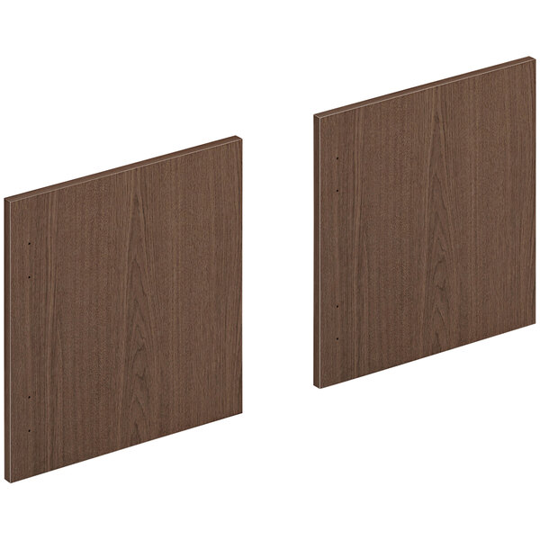 A pair of sepia walnut laminate wood panels.