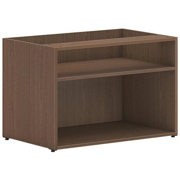 A brown wooden low open storage credenza with shelves.