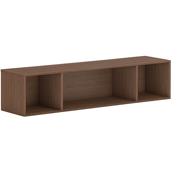 A brown wooden HON open storage cabinet with shelves.