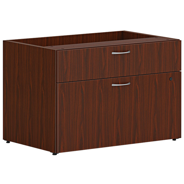 A brown wooden HON low personal credenza with 2 drawers.