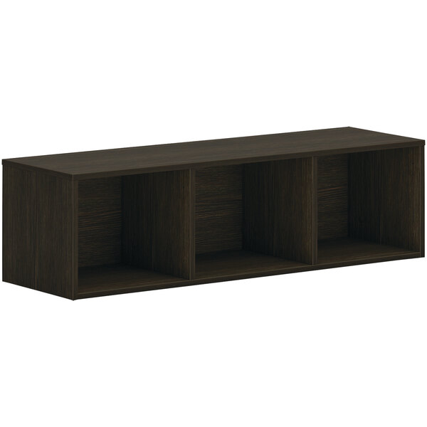 A Java oak wall mounted open storage cabinet with three shelves.