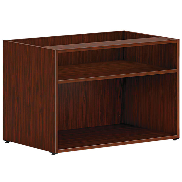 A HON traditional mahogany low open storage credenza with two shelves.